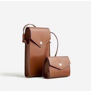 Perfect crossbody phone case and bill/credit card holder from j crew.